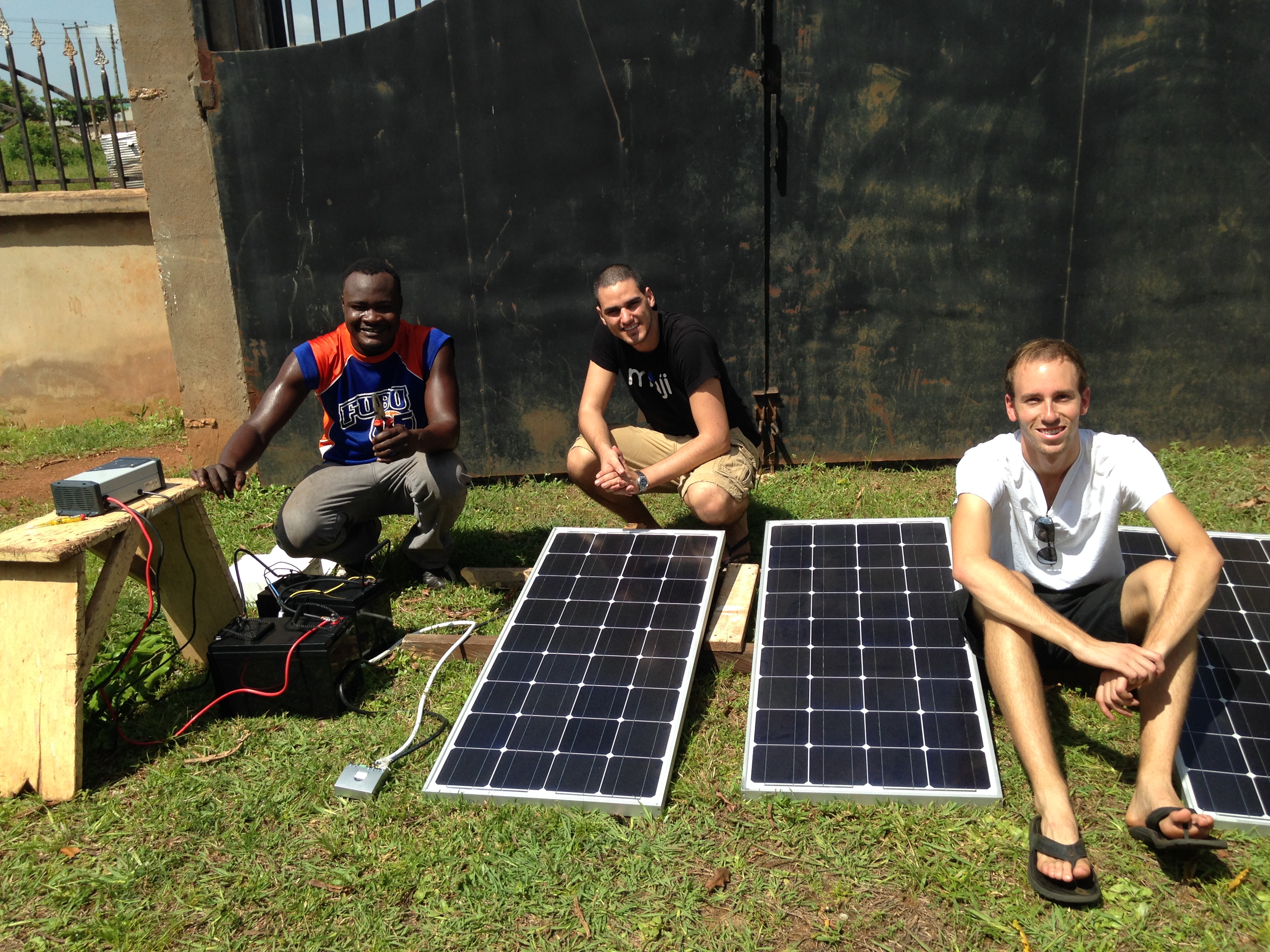 Shak, Mark, and Ben, checking out the fully-assembled Solar Panel system.