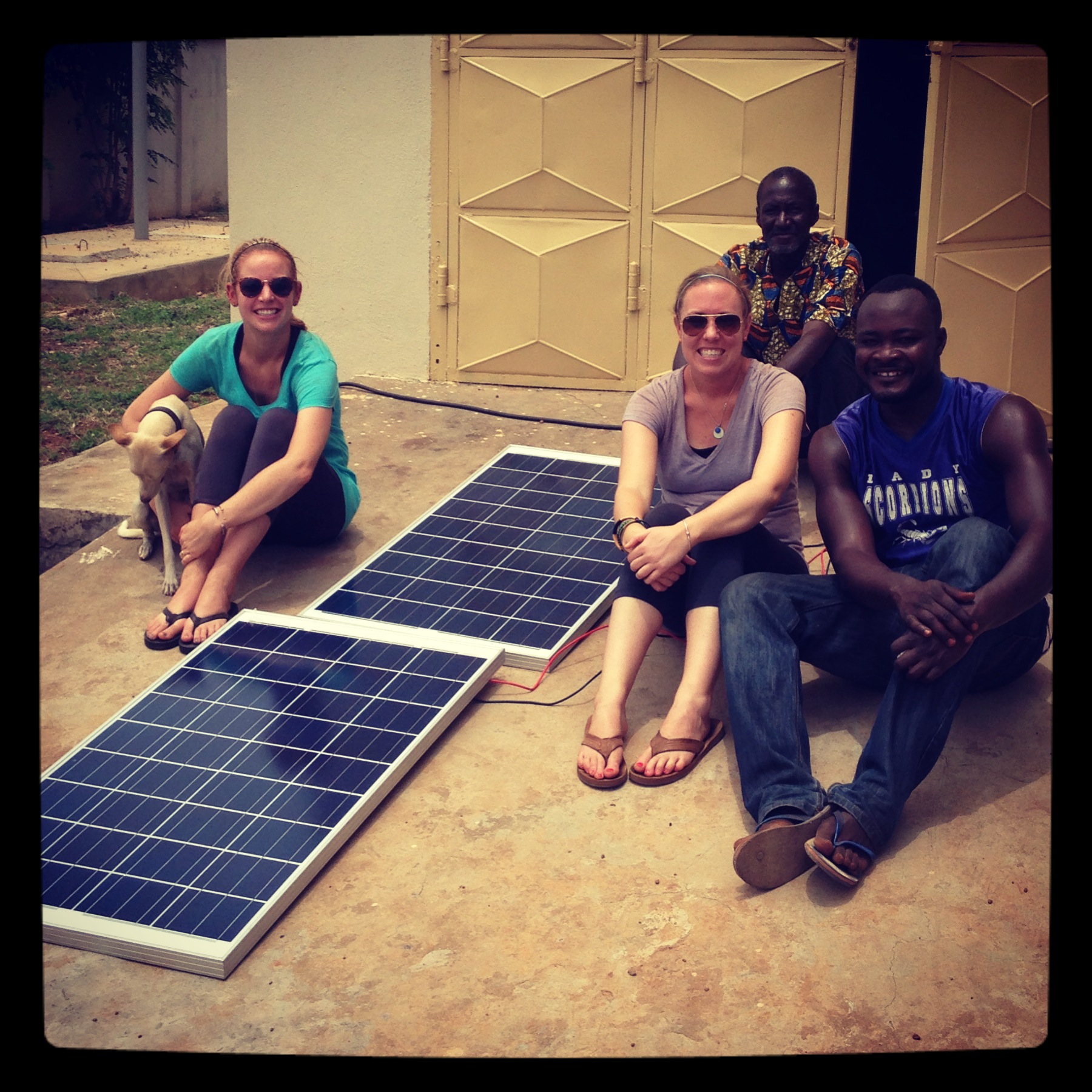 Sam, Yakabu, Kate and Shak testing out the solar panels - everything worked on our first try! 