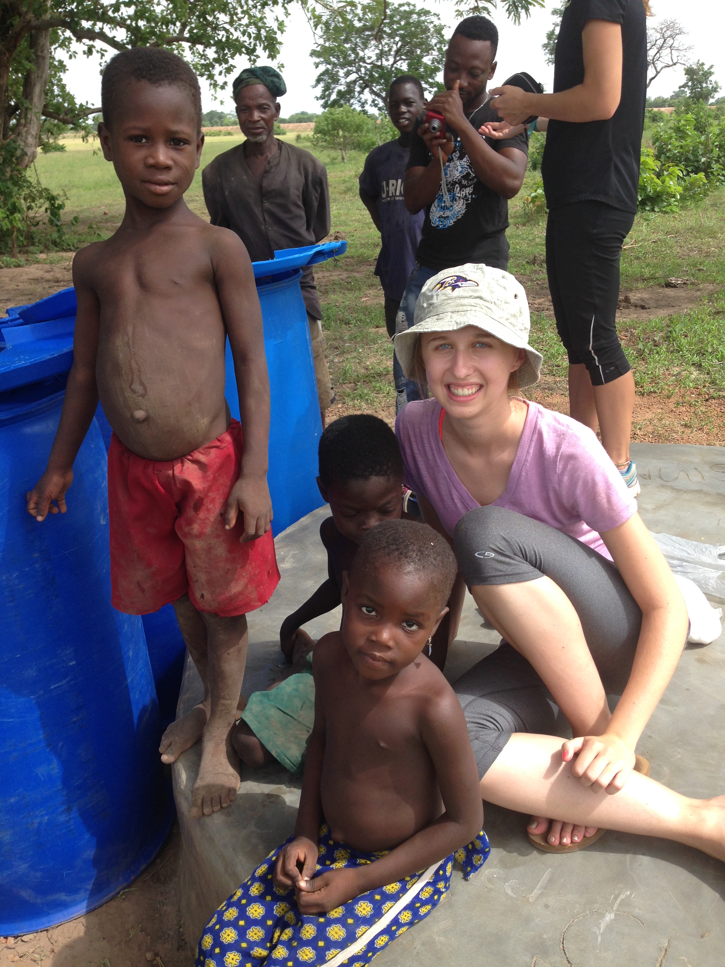 Melissa chilling with some kids on the polytank