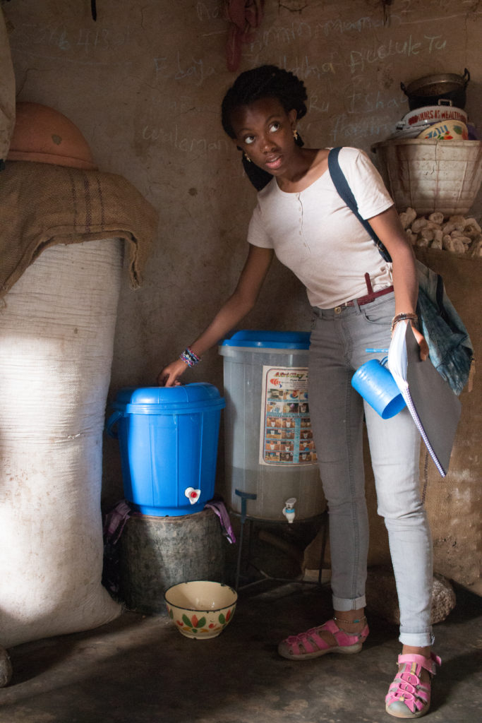 Ashley checks a safe storage container while monitoring. 